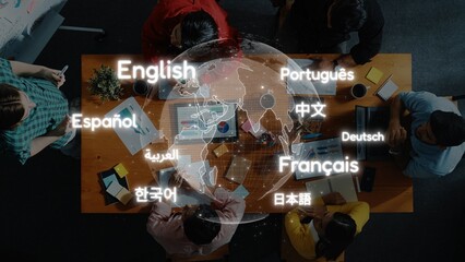 Aerial view of a diverse group engaged in a collaborative meeting with a map symbolizing global languages, promoting inclusive communication and teamwork. Raster