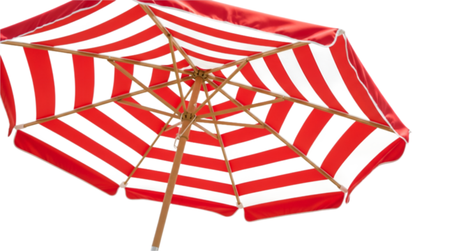 Vibrant red and black striped beach umbrella casting a shadow against a dark background evoking summer fun and protection from the sun