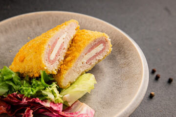 Cordon bleu cutlet meat dish French cuisine vegetable dish natural product tasty snack fresh delicious gourmet food background on the table rustic top view copy space