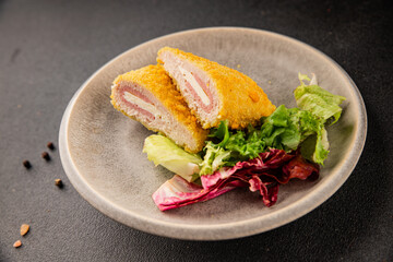 Cordon bleu cutlet meat dish French cuisine vegetable dish natural product tasty snack fresh delicious gourmet food background on the table rustic top view copy space