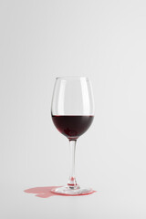 Spilled Red Wine Glass on White Background