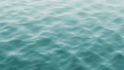 Obraz premium A blurred, turquoise depiction of rippling water, suggestive of ocean waves