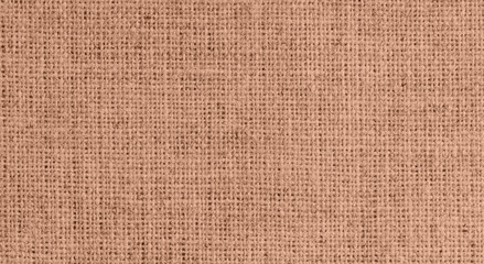Fototapeta premium Brown burlap fabric texture close-up, coarse woven textile background