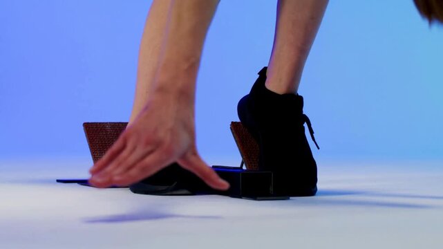 Extreme Close-Up Static Shot of Female Runner Preparing to Race | Focused Athlete Getting Ready at Starting Line in 4K Ultra HD