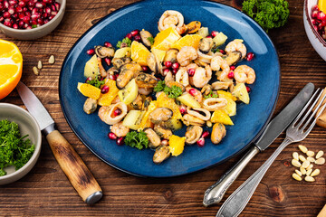 Appetizing salad with seafood.