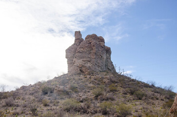 Discover the rugged beauty of the desert landscape with a rocky mountain, perfect for adventure travel or nature photography projects in the American Southwest