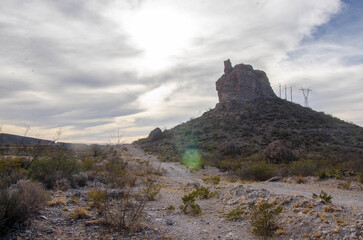 Discover the rugged beauty of the desert landscape with a rocky mountain, perfect for adventure travel or nature photography projects in the American Southwest