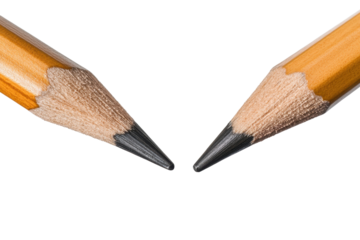 Two pencils with sharpened tips facing each other highlighting the details of their wooden bodies and graphite points in a bright, simple setting