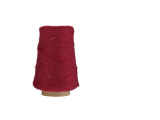 An Red thread spool with a smooth texture, wound on a cardboard bobbin, isolated on a white background. Ideal for sewing, embroidery, or craft projects, this earthy thread adds a natural