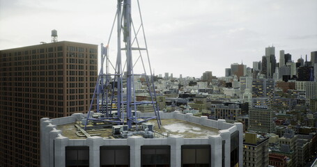 Fototapeta premium Rooftop perspective reveals a bustling city skyline with various buildings towering in the background. An antenna stands prominently, highlighting the urban landscape below.