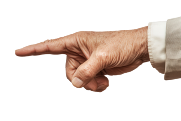 Elegant hand gesture of an aged individual expressing direction in a serene setting with soft lighting