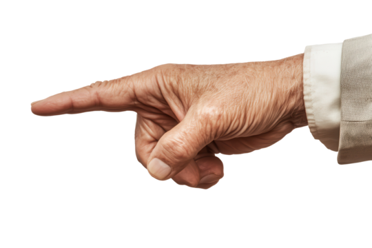 Elegant hand gesture of an aged individual expressing direction in a serene setting with soft lighting