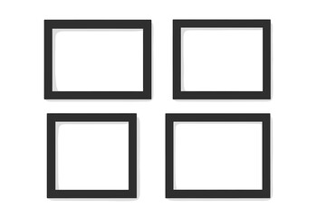Set of four black photo frames. Realistic vector illustration. Empty picture frame mockup template for portfolio or gallery wall. Interior decoration element on isolated background.