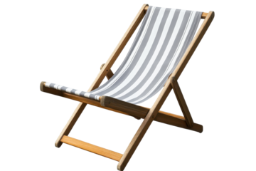Seaside Serenity captured in a cozy striped lounge chair set against a beautiful coastal backdrop during a sunny afternoon