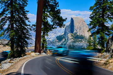 Glacier Point Road With Motion Blur Traffic and Iconic Half Dome Yosemite