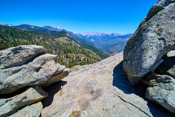 Moro Rock Granite Boulders and Forested Mountains Under Clear Blue Sky California