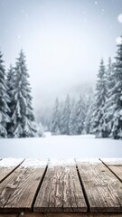 Fototapeta premium Empty Snow-Covered Wooden Table with a Blurry Background of a Winter Forest and Falling Snow