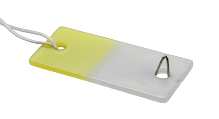 White and Yellow tag shows a textured surface with a modern style. Perfect for product photography, mockups, or industrial posters.