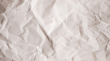 Crumpled white paper background.