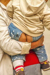 Instant access pants on child in farmers village in Xian, China.