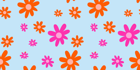 Hand drawn colorful floral vector seamless pattern in pink and orange color, childish style. Fun spring doodle flower illustration. For textile, fabric, wallpaper design. 