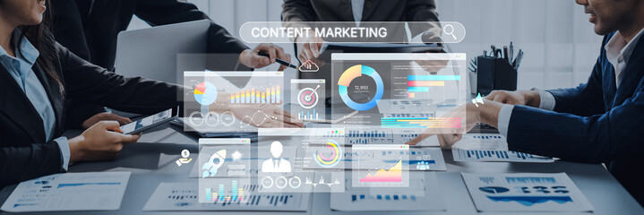 A diverse team collaborates on a digital marketing strategy using data analytics and statistics on screens to enhance content marketing efforts and drive business growth. Trope