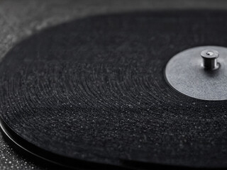 ﻿Flüstern der Rillen: Eine Schallplatte im Tanz des Staublichts