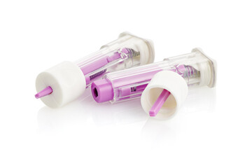 Medical scarifier isolated on white background. Automatic lancet scarifier for painless blood sampling. Blood test.