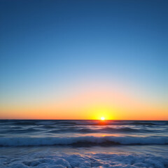 Fototapeta premium Serene Ocean Sunset with Gentle Waves and Clear Sky
