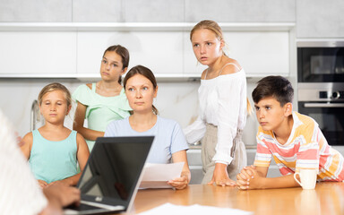 Caseworker came with a check to a mother of many children. Children are scared