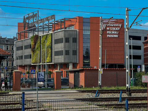 Opole, Poland, June 17, 2025: A building next to the Opole railway station with the inscription "Welcome to the capital of Polish song"