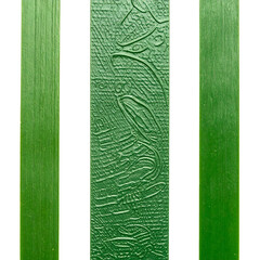 Green graphic two leaves flanking a textured, embossed green panel with bird design