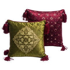 Two ornate velvet cushions, one green with gold design, the other red with pattern, tassels