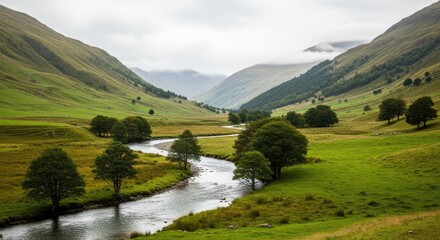 Scenic River Flowing Through Lush Green Valley Between Majestic Mountains.