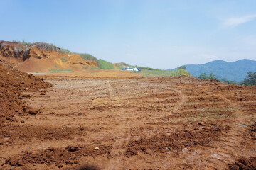 clearing of land at the top of mountains, which damages the environment, for the construction of houses and villas, prone to landslides
