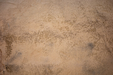 Aged Brown Plaster Wall Background Texture with Natural Weathered Surface