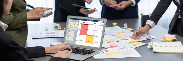 Analyst team use sticky note for creative and analytic brainstorm for business idea with BI data...