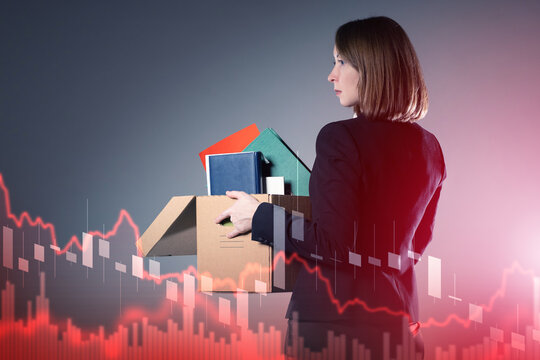 Businesswoman carrying box with office items symbolizing job loss and unemployment during financial crisis with stock market graph. Finance, Crisis, Unemployment - Powered by Adobe