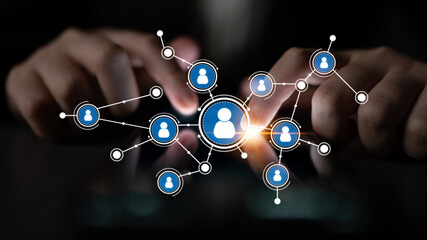 This image visually represents the concept of digital connections and social networking, showcasing hands typing on a smartphone surrounded by user icons in a network. Tessel