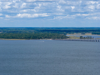 Aerial shot of a bridge over the ocean water in Ocean City Maryland USA