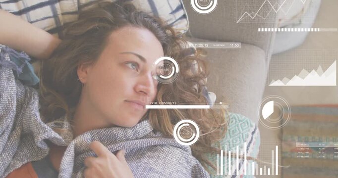 Woman reclining and interacting with timers and graphs appearing as tech overlays tracking progress
