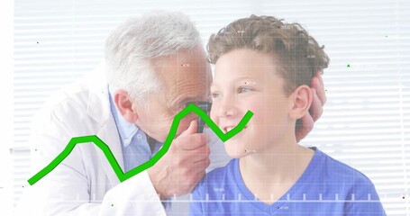 Senior male doctor lifting otoscope near boy's ear during medical exam showing graph tracking data - Powered by Adobe