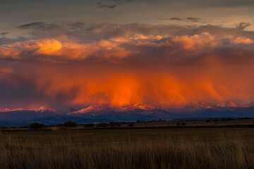 sunset storm cloud over the mountain