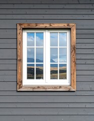 Fototapeta premium Wood-framed window on a gray wall