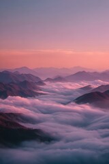 Misty Mountain Peaks at Dawns Embrace - A Panoramic View.