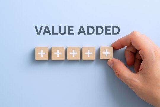 Value Added Concept with Wooden Blocks, Addition Symbols, and Human Hand on Blue Background - Powered by Adobe