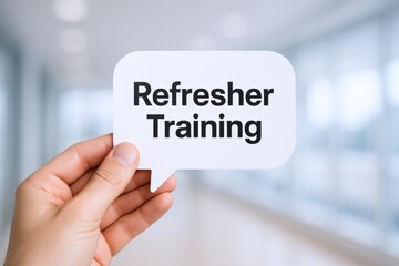 Hand Holding Refresher Training Sign in Office: Continuing Education and Professional Development Concept