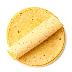 Two corn tortillas, one rolled atop the other, viewed from directly above