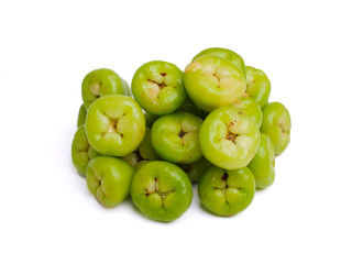 A close-up shot of a pile of fresh, green wax apples on a white background. The image captures the vibrant color and smooth texture of the tropical fruit.