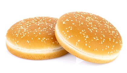 Two round sesame seed buns on white background